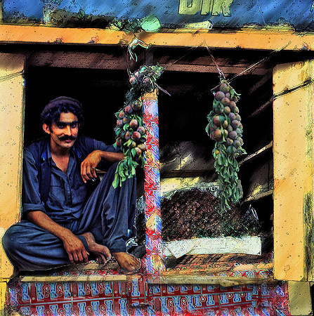 A FRUIT VENDER IN THE HINDU KUSH