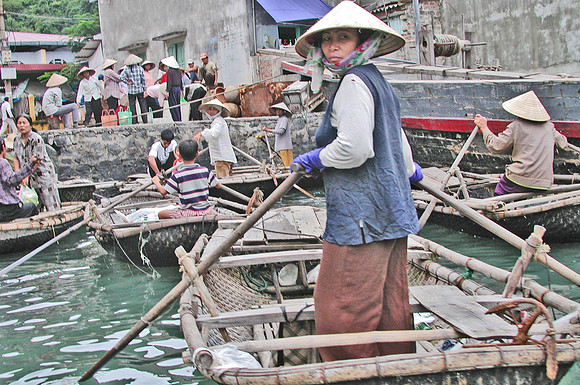 WOMAN ROWING OUT TO HARBOR 2000-1